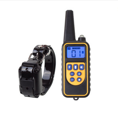 Three electric dog training collars in black, orange, and yellow with receivers, alongside a black and yellow remote control. - Image 20