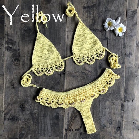Lake green handmade crochet bikini set with gold beads, featuring a triangle top and thong bottom on wood. - Image 3