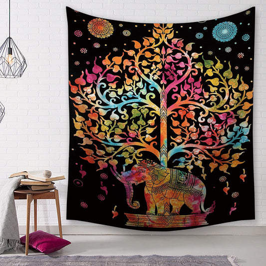 Colorful elephant and tree of life tapestry on a black background, featuring vibrant pink, orange, yellow, and blue hues.