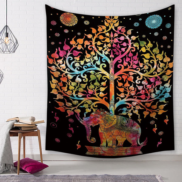Colorful elephant and tree of life tapestry on a black background, featuring vibrant pink, orange, yellow, and blue hues.