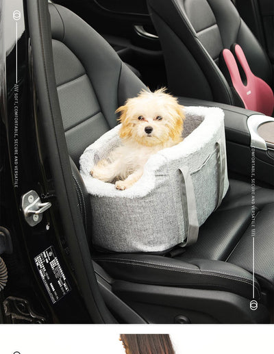 Grey pet car seat with plush white lining, designed for small dogs or cats, placed on a car's center console. - Image 10