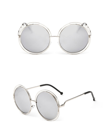 Round metal cutout sunglasses with silver mirrored lenses and a double-rimmed frame, shown from front and angled views. - Image 13