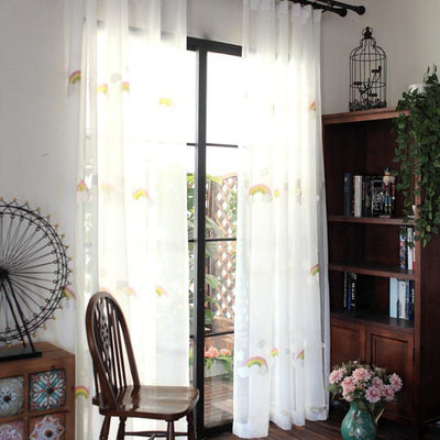 White sheer gauze curtain with colorful embroidered rainbows and grey clouds, suitable for a child's room. - Image 7