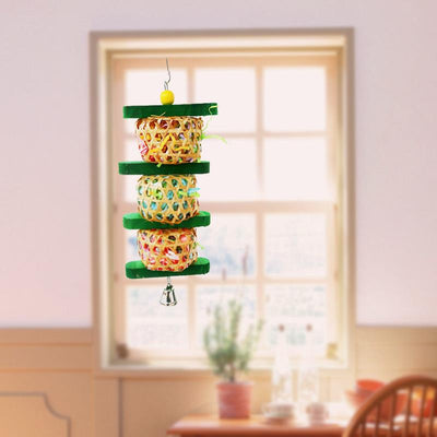 Colorful parrot toy with three rattan woven balls filled with paper, green wooden blocks, a yellow bead, and a bell.