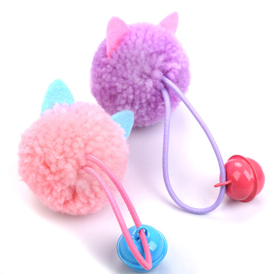 Teal plush mouse head cat toy with green ears, black eyes, pink nose, and a green bell on a light blue string. - Image 3