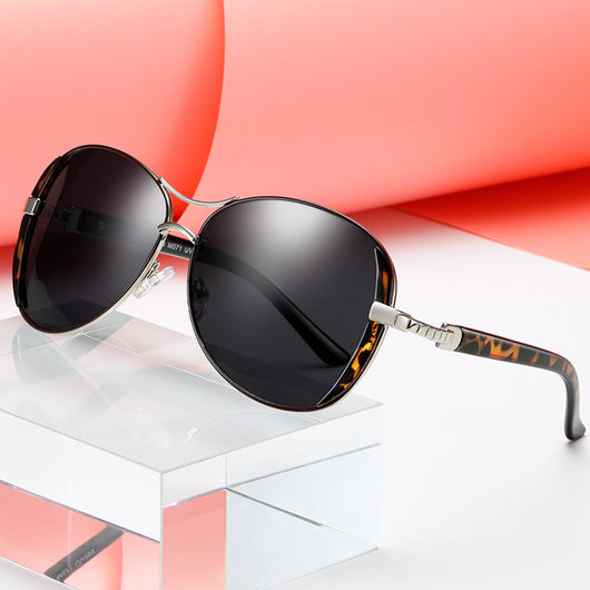 Women's large frame fashionable sunglasses with gradient gray lenses, silver-tone metal frames, and white arms. - Image 2