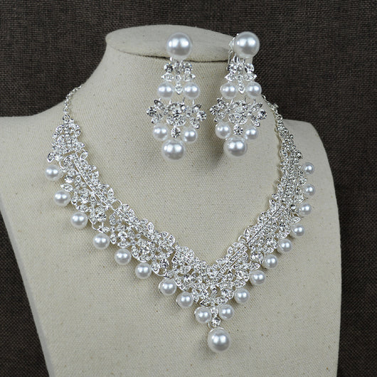Silver-tone necklace and matching chandelier earrings set with clear rhinestones and white faux pearls. - Image 5