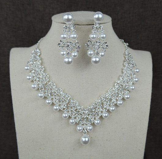 Silver-tone necklace and matching chandelier earrings set with clear rhinestones and white faux pearls. - Image 2