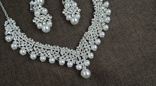 Silver-tone necklace and matching chandelier earrings set with clear rhinestones and white faux pearls. - Image 3