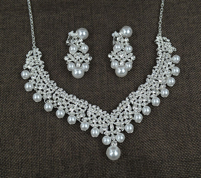 Silver-tone necklace and matching chandelier earrings set with clear rhinestones and white faux pearls. - Image 4