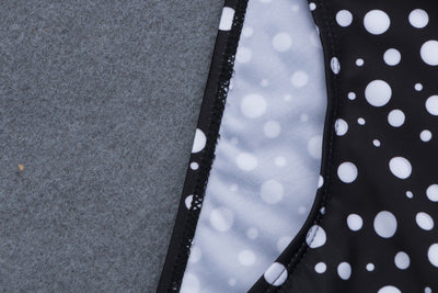 Retro black and white polka dot bikini with a tie-front top and high-waisted bottom. - Image 2