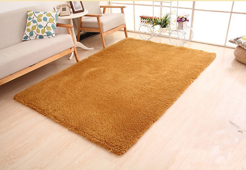 Fluffy purple rectangular area rug on a light wood floor in a modern living room with a sofa and plant stand. - Image 6