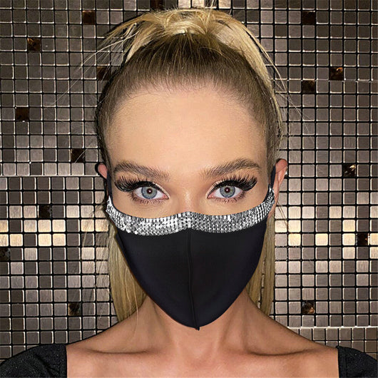 Woman wearing a black adjustable face mask with a shimmering silver rhinestone trim along the top edge. - Image 14