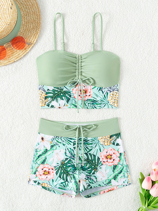 Women's light green two-piece bikini swimsuit with tropical floral and pineapple print, featuring drawstring top and shorts. - Image 13