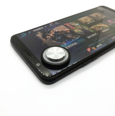 Pink and silver mobile game joystick attached to a black smartphone displaying a game on its screen. - Image 9