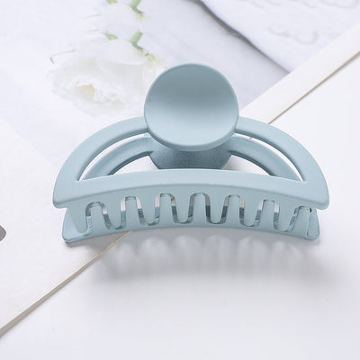 Frosted light blue rectangular hair claw clip with a gold-toned spring mechanism, ideal for securing hair. - Image 6