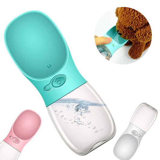 White portable pet water bottle with a clear reservoir and built-in drinking bowl, shown in a bag. - Image 6
