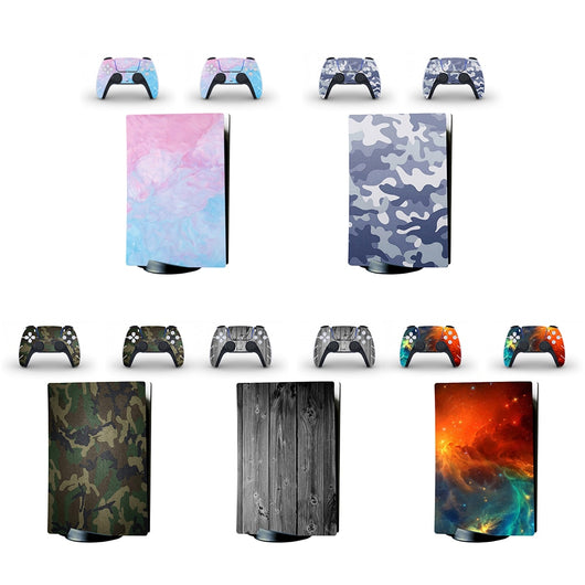 Camouflage full body sticker set for PlayStation 5 optical drive console and two matching DualSense controllers.