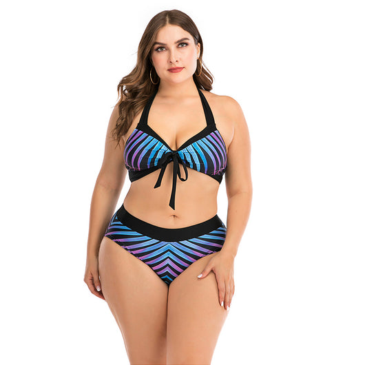 Plus size two-piece swimsuit with a black base, colorful geometric pattern, criss-cross top, and high-waisted bottom. - Image 34