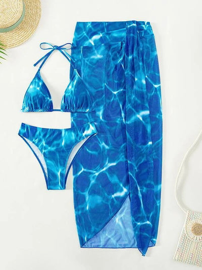 Women's pink and white tie-dye three-piece bikini swimsuit with a halter top, bottoms, and high-slit sarong. - Image 22