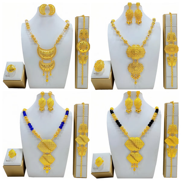 High-end gold-tone bridal wedding jewelry set with necklace, crescent earrings, ring, and bracelet, featuring intricate patterns and clear beads.