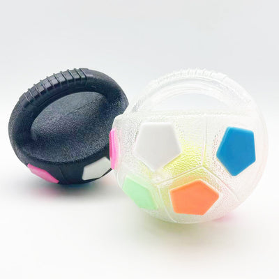 Black and white soccer ball dog toy with a textured handle, designed for interactive play and self-amusement. - Image 8
