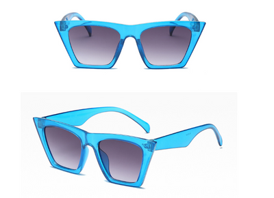 Transparent nude cat-eye sunglasses with brown gradient lenses, featuring a vintage 90s fashion style for women. - Image 14