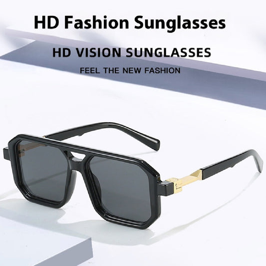 Black octagonal sunglasses with dark gray lenses and gold-colored temple accents, suitable for fashion wear.