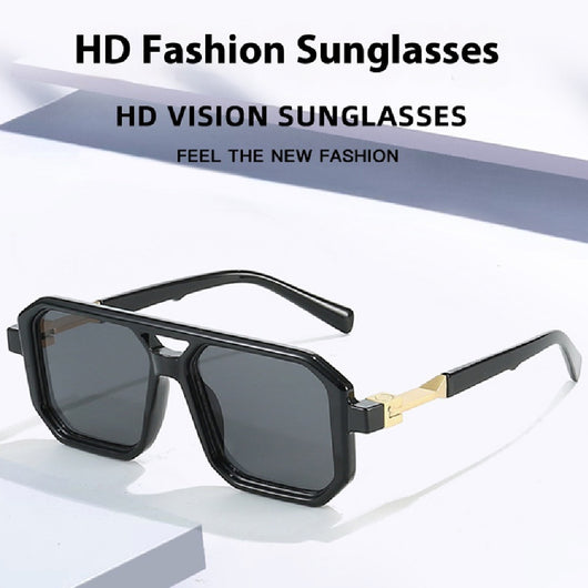 Black octagonal sunglasses with dark gray lenses and gold-colored temple accents, suitable for fashion wear.