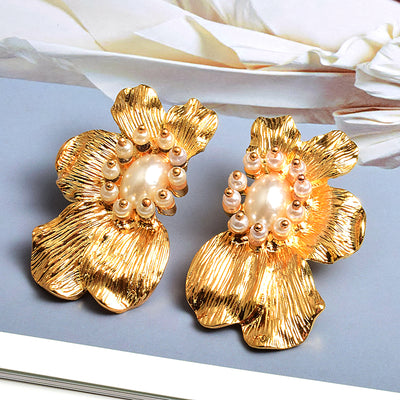 Aretes de Flores Exageradas con Metal Simétrico - Estilo Europeo y Americano - Image 10