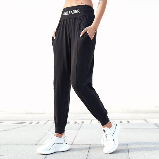 Pantalones deportivos con cintura ajustable y lettering
