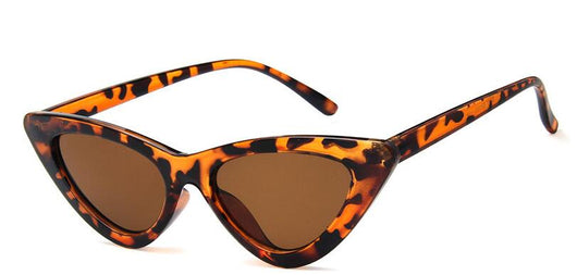 Retro cat-eye sunglasses with a tortoiseshell frame and dark lenses, ideal for a stylish, vintage look. - Image 9