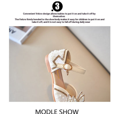 Beige girls' shallow mouth pumps with a large pink pearl bow, glitter, and an ankle strap with a gold buckle. - Image 10