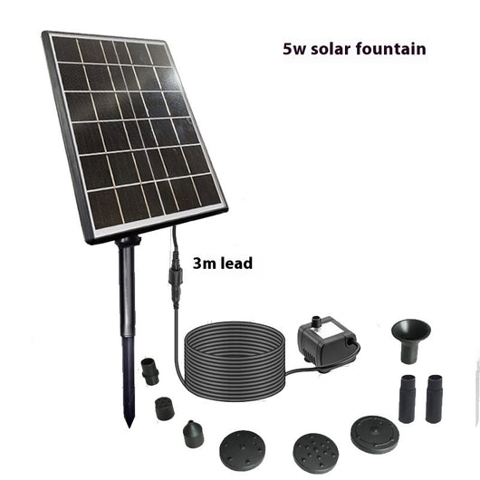 5W solar fountain kit with black solar panel on a ground stake, water pump, coiled hose, and various nozzles. - Image 8