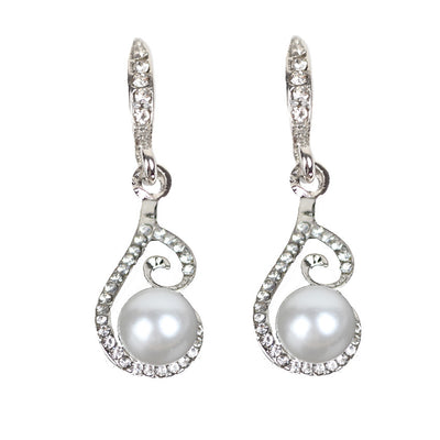 Silver-tone rhinestone and faux pearl drop necklace and matching earrings jewelry set on a black background. - Image 3