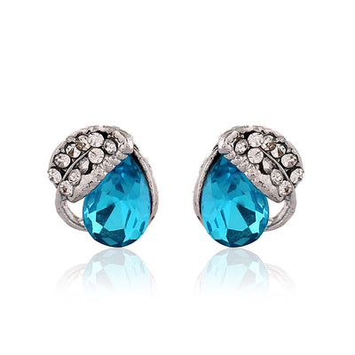 Silver-tone jewelry set with teardrop blue gemstones and clear rhinestones, including a necklace, bracelet, and earrings. - Image 4