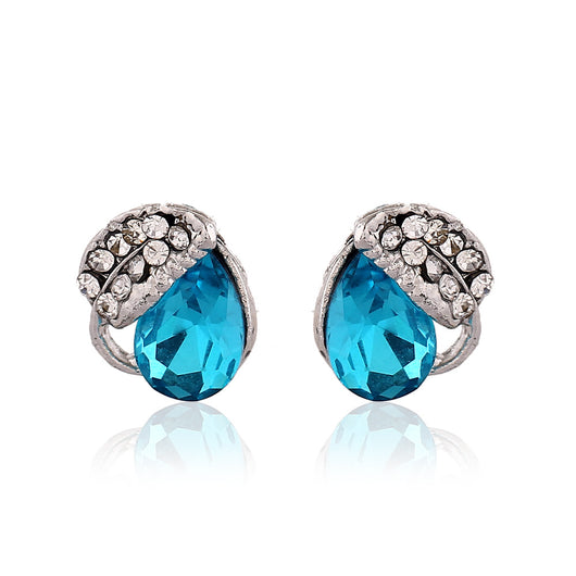 Silver-tone jewelry set with teardrop blue gemstones and clear rhinestones, including a necklace, bracelet, and earrings. - Image 4