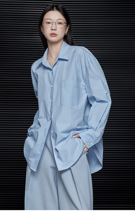 Blusa Minimalista Suelta Azul de Manga Larga para Mujer - Image 10