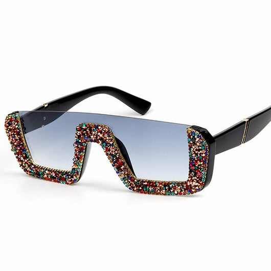 Black square sunglasses with a wavy top frame embellished with brown and clear rhinestones and gradient smoke lenses. - Image 2