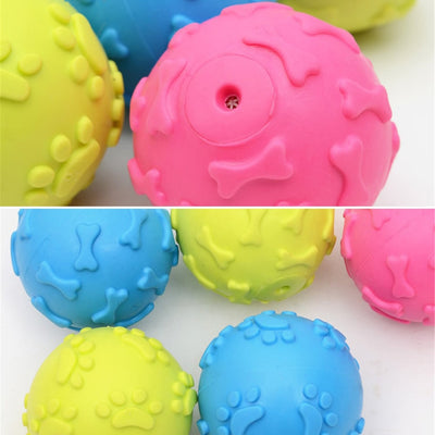 Five colorful TPR rubber pet toy balls in blue, pink, and yellow, with embossed paw print and bone patterns. - Image 6