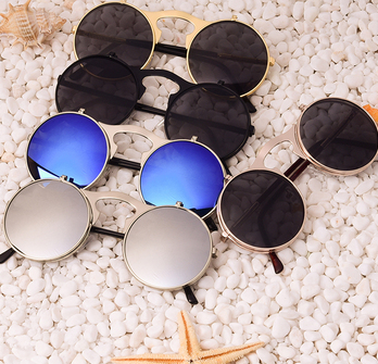 Retro flip-up sunglasses with round dark polarized lenses and a gold-tone metal frame with dark red temples. - Image 4