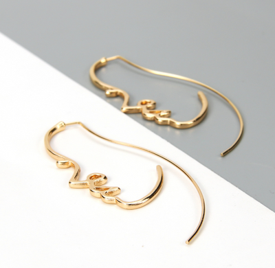 Aretes Artísticos de Silueta Facial - Estilo y Personalidad - Image 4