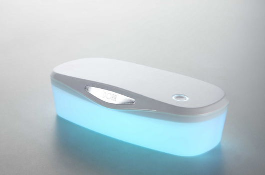 White and grey ultraviolet sterilization box with a glowing blue interior, ideal for sanitizing small items. - Image 5
