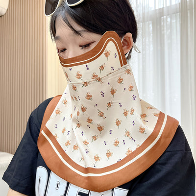 Female cream and black floral polka dot sun protection mask with ear loops, designed for eye corner protection. - Image 33