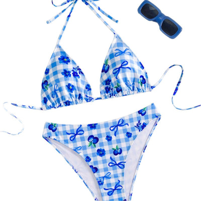 Resort-style blue and white gingham bikini set with blueberry and bow print, featuring a halter triangle top and high-cut bottoms. - Image 5