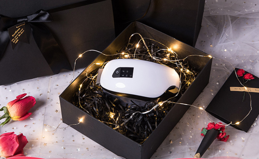 White Bluetooth music eye massager with control panel, air pressure, and hot compress functions in a gift box. - Image 8