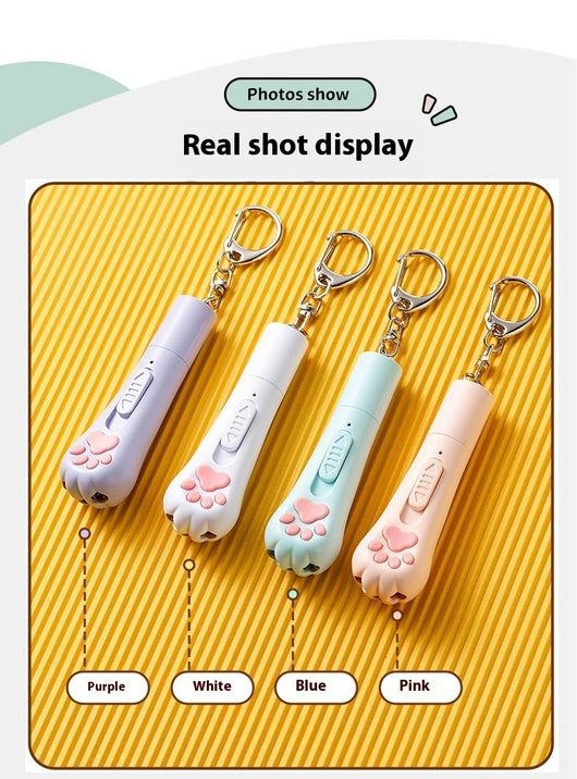 Pink cat paw pen light toy with red laser, UV light for urine detection, and white LED illumination, featuring a keychain. - Image 11