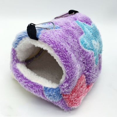 Colorful plush pet sleeping bag with purple, blue, and pink blocks, white fleece lining, and metal hooks for hanging. - Image 5