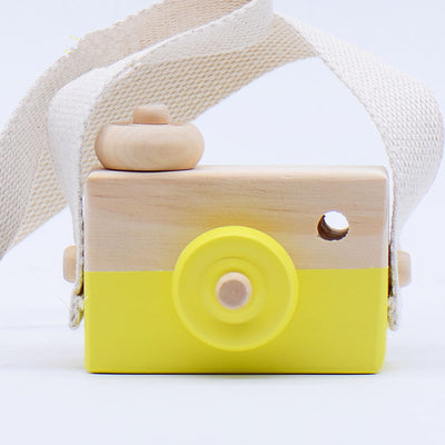 Two-tone wooden toy camera in natural wood and light blue with a cream fabric strap, for babies and kids. - Image 9