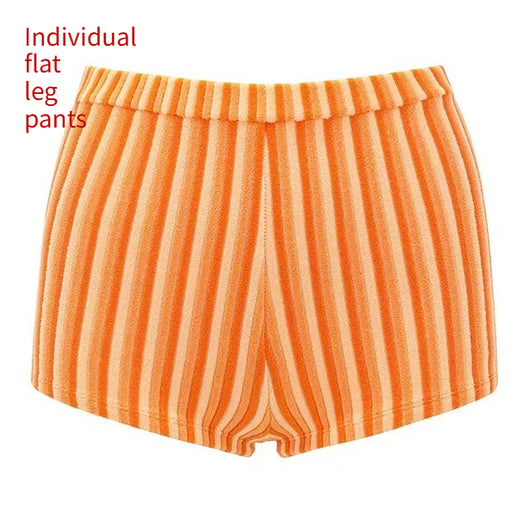 Orange and light orange striped bikini bottom with a ribbed texture and elastic waistband, ideal for beach vacations. - Image 10
